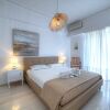 Отель L' apartment blanc dans le centre de Glyfada, фото 19