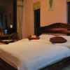 Отель Dali Shuanglang Mafengwo Inn, фото 4