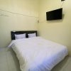 Отель SPOT ON 93452 Wulan Homestay 2  Syariah, фото 7