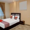 Отель Capital O 92125 Wira Guest House, фото 6