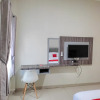 Отель RedDoorz Syariah near GOR Satria Area, фото 11