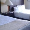 Отель Bridgepointe Inn & Suites, фото 8