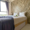 Отель Homey And Clean Studio At Sky House Alam Sutera Apartment, фото 10