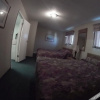 Отель Outpost Motel & Kitchenette Suites, фото 3