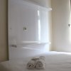 Отель Cozy Stay and Simply 2BR at Green Pramuka City Apartment, фото 4