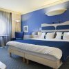 Отель Holiday Inn Athens Attica Av. Airport West, an IHG Hotel, фото 4