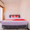 Отель OYO 2728 Sinulingga Residence, фото 6