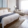 Отель Echarm Hotel Jingmen Intime City, фото 5