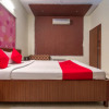 Отель OYO 16075 Aikya Elevens Inn, фото 15