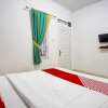 Отель OYO Life 91068 Penginapan Way Semaka Syariah, фото 18