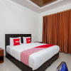 Отель Aries Hotel by OYO Rooms в Сиборонгборонг