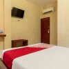 Отель Capital O 615 Residence Puri Hotel Syariah, фото 5