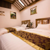 Отель Zhangjiajie Tujia Theme Hostel, фото 3