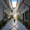 Отель Duplex Escoberos Courtyard, фото 18