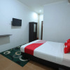 Отель OYO 1864 Tiara Guest House, фото 3