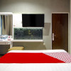 Отель OYO 1057 Premier Guest House, фото 4