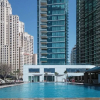 Отель Grand 2BR w/ a Full Sea View & Direct Beach Access, фото 1