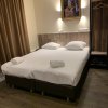 Отель Orange Tulip Hotel Amsterdam - Hostel в Амстердаме