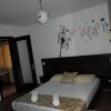 Отель Apartments and Rooms Four Roses, фото 9