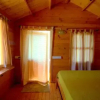 Отель Pele's Windsong Wood Cottage on the beach, фото 5