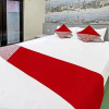 Отель OYO 91202 Family Guest House Syariah, фото 19