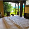Отель Lugu Lake Caoshe Vacation Inn, фото 11