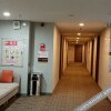 Отель Yuping Jufeng Apartment, фото 4