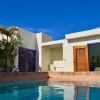 Отель Villas at Indigo Reef в Вест-Энде Вилледже