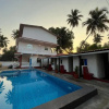 Отель Pool Side Cottages in La Paulo's B2B in Morjim, фото 5