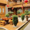 Отель Lijiang Happyland Inn, фото 1