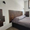 Отель Suite Apartments i4MORI Porto Pino, фото 6