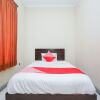 Отель Oyo 1430 Hotel Ratna Syariah, фото 4