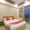 Отель OYO Flagship 71322 Red Comfort Inn, фото 2