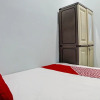 Отель OYO 92721 Planet Guest House Syariah, фото 3