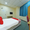 Отель OYO 90672 De Paradise Turtle Hotel, фото 3