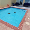 Отель Chris Beach Pool Townhome, фото 16