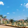 Отель Laburnam Courts Four Bedroom Apartments в Кампале