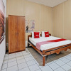 Отель OYO 92270 Grand Village Syariah, фото 30