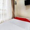 Отель OYO 256 Sakura Suites, фото 11