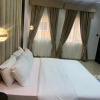 Отель Captivating 3-bed Apartment in Ikeja, фото 16