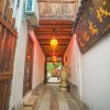 Отель Tian Long Inn - Lijiang, фото 2