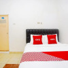 Отель Oyo 91460 Guest House Kencana Syariah, фото 3