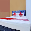 Отель OYO 90476 Iksan Homestay Syariah, фото 8