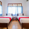 Отель Komala Indah Cottages by OYO Rooms, фото 5