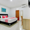Отель OYO 90671 Petanu Residence, фото 3