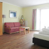Отель Ferienwohnung 1 2 14 Inselstrand, фото 3
