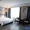 Отель Xinhai Hotel Zhecheng, фото 7
