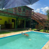 Отель Suítes aconchegantes com piscina e praia, фото 29
