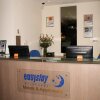 Отель Easystay Apartments Raglan Street, фото 1