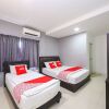 Отель OYO 89702 Md Hotel Masai, фото 4